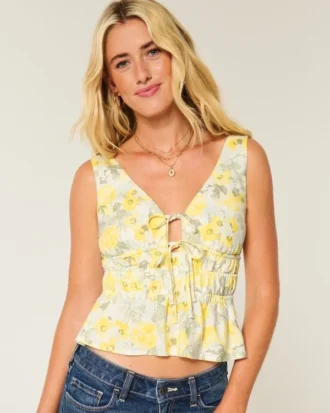 Top peplum com laço frontal em mistura de linho