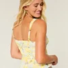 Top peplum com laço frontal em mistura de linho