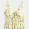 Top peplum com laço frontal em mistura de linho