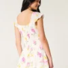Vestido com saia-calça e mangas esvoaçantes