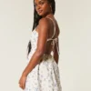 Vestido com saia-calça em mistura de linho com costas abertas