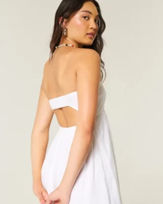Vestido maxi sem alças com torção no busto
