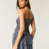 Vestido mini-saia de malha sem alças