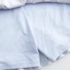 Vestido mini-saia de malha sem alças