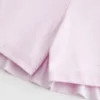 Vestido mini-saia de malha sem alças